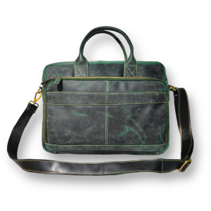 Leather bags for men in Germany displayed in a professional lifestyle setting