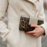 Leather clutch bags in Germany shown in a modern lifestyle setting