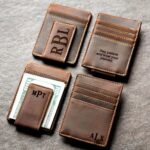 Logo engraved leather money clip in Germany with cash and cards